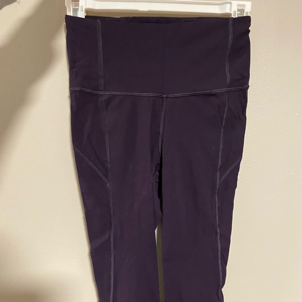 Lululemon leggings dark purple with laser cut bottom